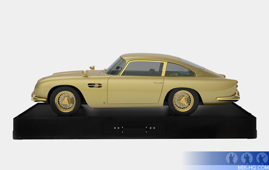 James Bond's Aston Martin DB5 third scale gold model.